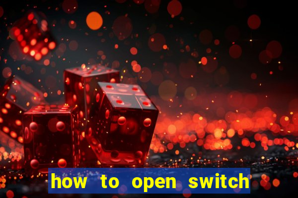 how to open switch oled game card slot