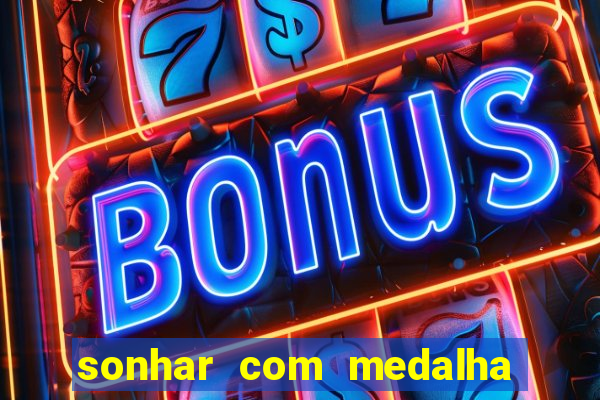 sonhar com medalha de santo